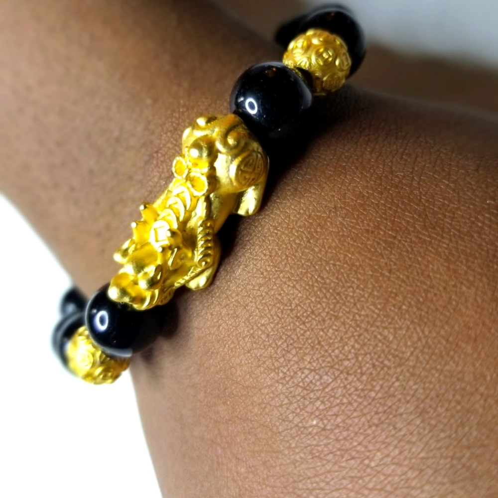 Gold Tone Black and Gold Bead Dragon Bracelet